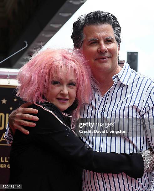 Singer Cyndi Lauper and husband actor David Thornton attend Cyndi Lauper and Harvey Fierstein being honored with a Double Star ceremony on the...