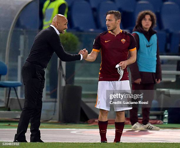 Luciano Spalletti and Francesco Totti of AS Roma during the Serie A match between AS Roma and Bologna FC at Stadio Olimpico on April 11, 2016 in...