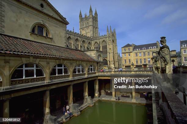 roman baths at bath - bath abbey stock pictures, royalty-free photos & images