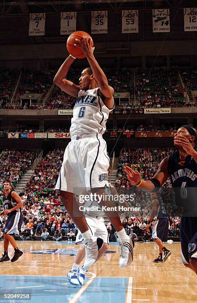 Howard Eisley of the Utah Jazz rebounds against the Memphis Grizzlies on January 22, 2005 at the Delta Center in Salt Lake City, Utah. NOTE TO USER:...