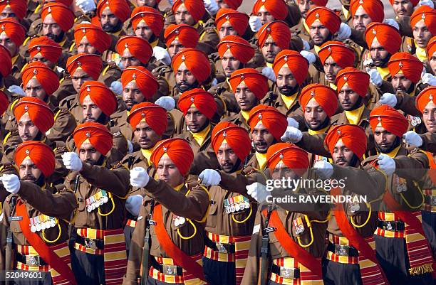 Indian army soldiers from Sikh regiment march during a full final dress rehearsal parade for India's forthcoming Republic Day celebrations in New...