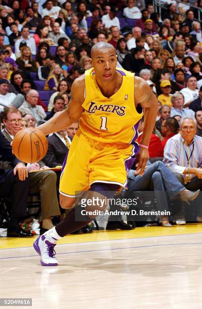 Caron Butler of the Los Angeles Lakers drives to the hoop against the Golden State Warriors on January 21, 2005 at the Staples Center in Los Angeles,...