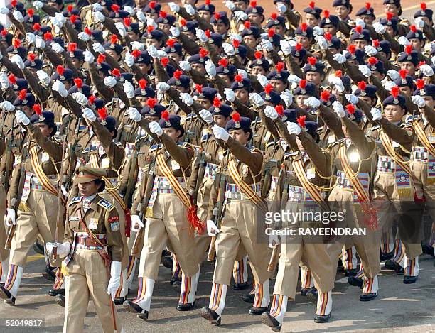 Women para-military members from the Central Reserve Police Force march during a full final dress rehearsal parade for India's forthcoming Republic...