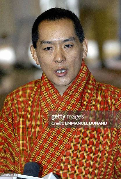 In this picture taken 15 September 2003, Bhutan's King Jigme Singye Wangchuk addresses media representatives during a ceremony at Rashtrapati Bhavan...