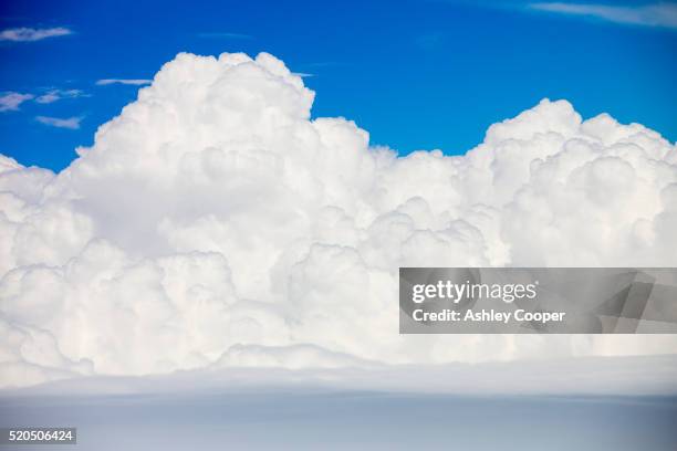 cumulo nimbus cloud seen from an airplane window over argentina. - cumulo stock-fotos und bilder