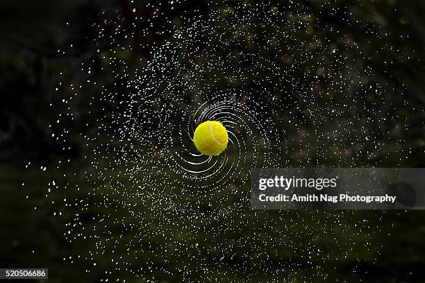 tennis ball milky way - liquid galaxy stock pictures, royalty-free photos & images