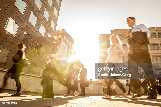 commuters walking - rush hour stock pictures, royalty-free photos & images