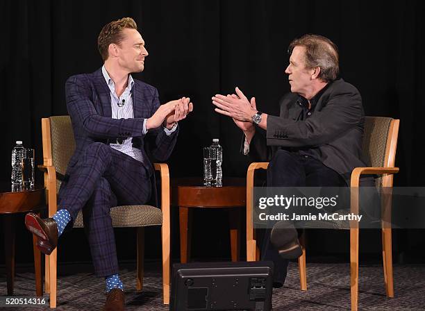 Tom Hiddleston and Hugh Laurie speak onstage during The New York Times TimesTalks at Directors Guild of America Theater on April 11, 2016 in New York...