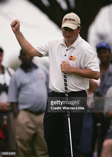 Tim Clark of South Africa celebrates a birdie putt on the 10th hole during the final round of South African Airways Open at Durban Country Club on...