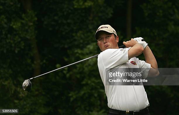 Tim Clark of South Africa tees off on the ninth hole during the final round of South African Airways Open at Durban Country Club on January 23, 2005...