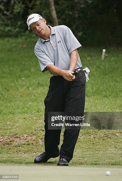 Tjaart Van Der Walt of South Africa reacts after missing a putt on the fourth hole during the final round of South African Airways Open at Durban...