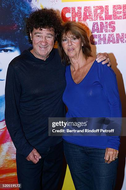 Singer Robert Charlebois poses with his wife Laurence before his "50 ans, 50 chansons" : Concert at Bobino on April 11, 2016 in Paris, France.