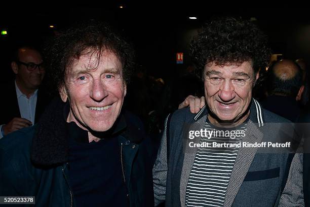 Singers Alain Souchon and Robert Charlebois pose after the Robert Charlebois : "50 ans, 50 chansons" : Concert at Bobino on April 11, 2016 in Paris,...