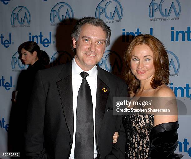 Producer John Walker and guest arrive at the 16th Annual Producers Guild Awards at Culver Studios on January 22, 2005 in Culver City, California.