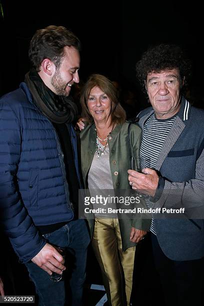 Writer Joel Dicker with Robert Charlebois and his wife Laurence pose after the Robert Charlebois : "50 ans, 50 chansons" : Concert at Bobino on April...