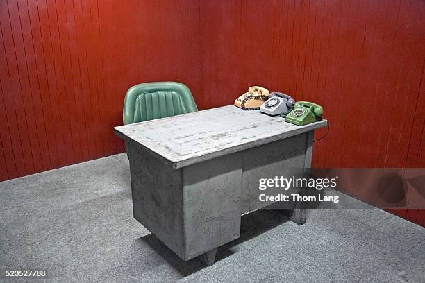 three rotary phones on bare desk - archival office stock pictures, royalty-free photos & images