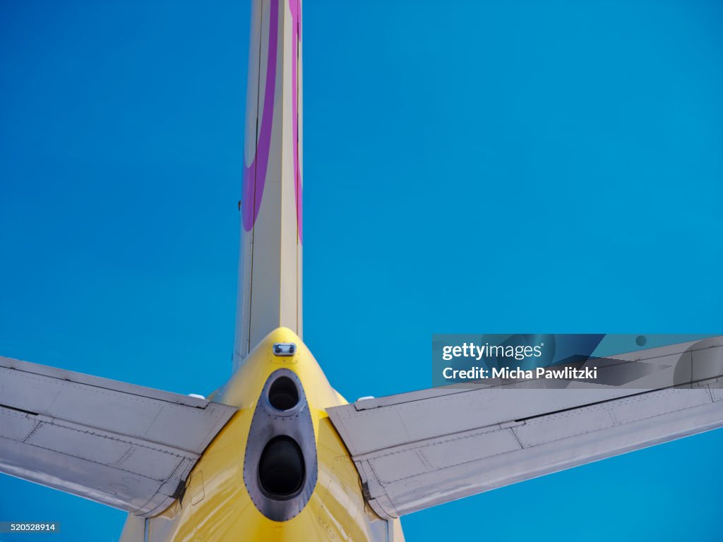 Yellow Aircraft against Blue Sky