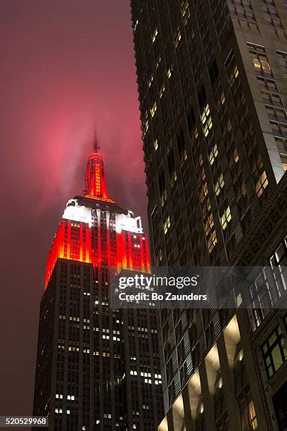 empire state building - empire state building red stock pictures, royalty-free photos & images