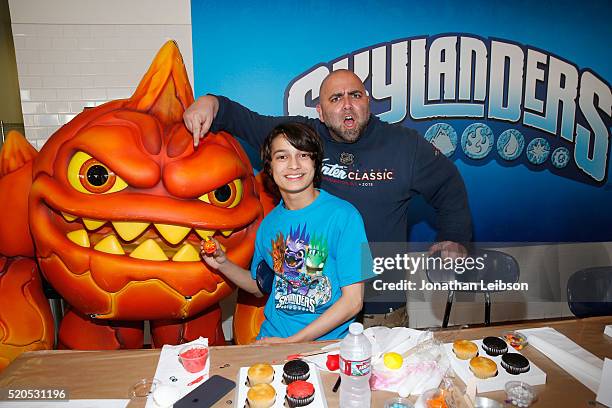 Chef Duff Goldnman , Rio Mangini and Skylanders Eruptor celebrate the fifth year of the wildly popular videogame franchise, Skylanders, at Duff's...