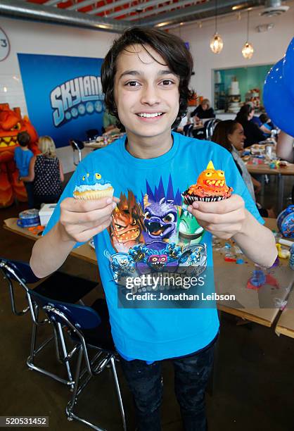Rio Mangini helps Skylanders celebrate the fifth year of the wildly popular videogame franchise at Duff's Cakemix on April 11, 2016 in West...