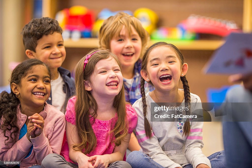 Teacher Reading a Story to Her Students