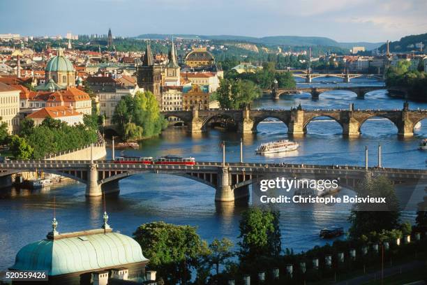 prague bridges over vltava river - río vltava fotografías e imágenes de stock