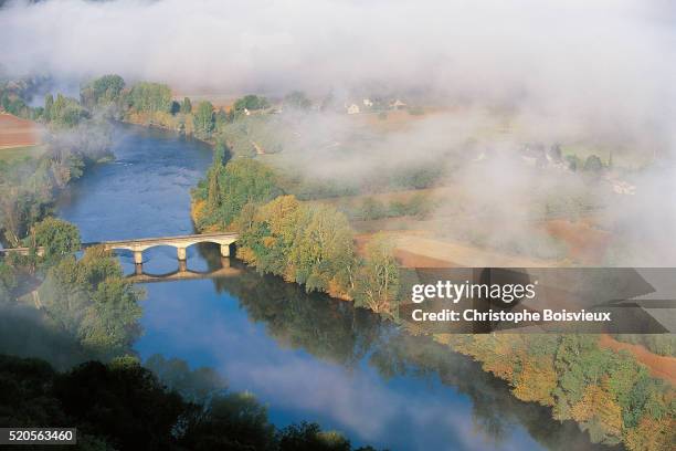 morning fog over river - dordogne stock pictures, royalty-free photos & images