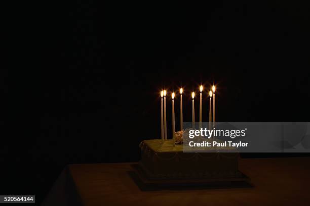 birthday cake with birthday candles - cake candles dark stock pictures, royalty-free photos & images