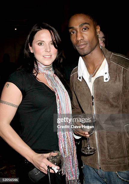 Blue member Simon Webbe and singer Mel C arrive at the Celebrity Screening for film "Meet The Fockers" at the Covent Garden Hotel on January 24, 2005...