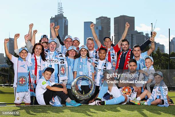 Melbourne City FC player Bruno Fornaroli and Damien de Bohun, Head of Hyundai A-League, and City fans pose with the Hyundai A-League Championship...