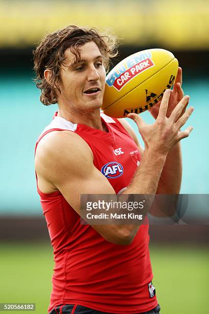 Kurt Tippett of the Swans handles the ball during a Sydney Swans AFL training session at Sydney Cricket Ground on April 12, 2016 in Sydney, Australia.