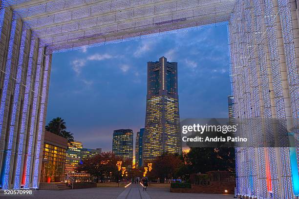 yokohama landmark tower seen through lit archway - kanagawa prefecture stock pictures, royalty-free photos & images