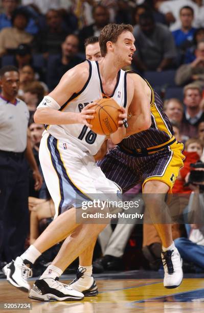 Pau Gasol of the Memphis Grizzlies moves the ball during the game with the Indiana Pacers at FedexForum on January 11, 2005 in Memphis, Tennessee....