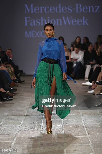 Model walks the runway during the Juan Carlos Obando show at Mercedes-Benz Fashion Week Mexico Autumn/Winter 2016 at Colegio De Las Vizcainas on...