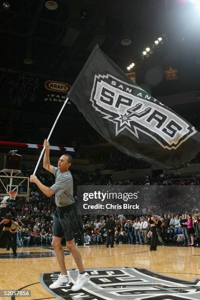 The San Antonio Spurs flag team prances to inspire the crowd during the game with the Indiana Pacers at the SBC Center on January 6, 2005 in San...