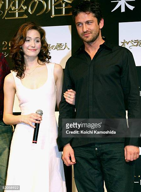 Actress Emmy Rossum and actors Gerard Butler attend a press conference to promote "Phantom of the Opera" on January 25, 2005 in Tokyo, Japan. The...