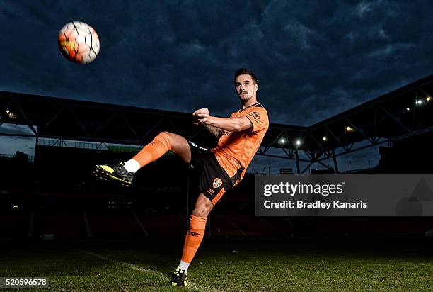 Brisbane Roar player Jamie Maclaren strikes the ball during a portrait session at Suncorp Stadium on April 12, 2016 in Brisbane, Australia.