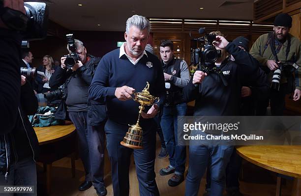 European Ryder Cup captain Darren Clarke arrives with the trophy at Royal Portrush golf club as part of the Ryder Cup Trophy Tour launch on April 12,...
