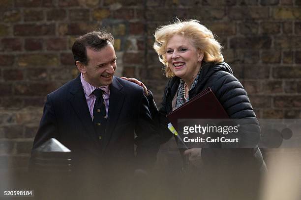 Secretary of State for Wales, Alun Cairns , laughs with Anna Soubry, the Minister for Small Business, Industry and Enterprise, as they arrive for a...