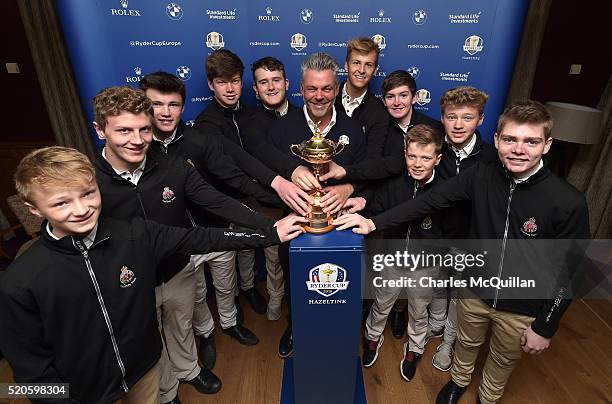 European Ryder Cup captain Darren Clarke poses with the Ryder Cup with members of Royal Portrush's junior Fred Daly team including his son Tyrone...