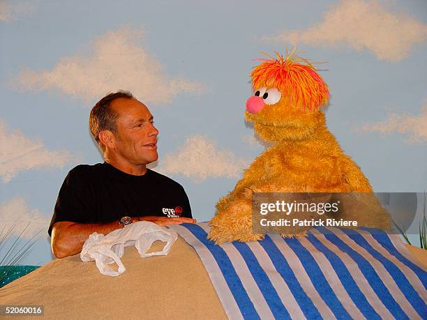 February 2004 - Australian surfer Tom Carroll with Australia's first muppet Ollie on the Nickelodeon Channel in Sydney, Australia.