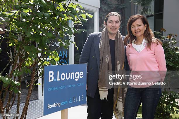 Elle.it Director Luca Lanzoni and Elle Italia Director Danda Santini pose at the Elle.it lounge during the Milan Design Week on April 13, 2016 in...