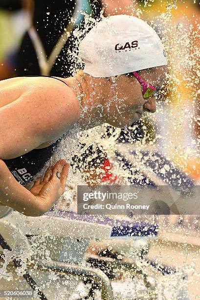 Emily Seebohm of Australia sprays herself with water before competing in the Women's 200 Metre Backstroke during day six of the 2016 Australian...