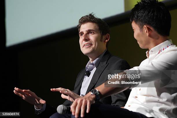 Eduardo Saverin, co-founder Facebook Inc., left, speaks at the Tech in Asia conference in Singapore, on Tuesday, April 12, 2016. Saverin has been...
