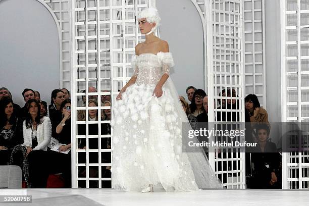 Models walk down the runway during the Chanel fashion show, part of Paris Fashion Week Spring/Summer 2005 on January 25, 2005 in Paris, France.