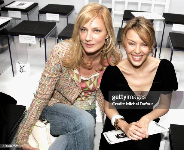 Singer Kylie Minogue and actress Joely Richardson attend the Chanel fashion show, part of Paris Fashion Week Spring/Summer 2005 on January 25, 2005...
