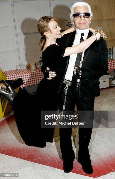 Karl Lagerfeld and Kylie Minogue are seen backstage during the Chanel fashion show, part of Paris Fashion Week Spring/Summer 2005 on January 25, 2005...