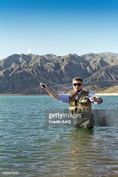 mosca pescador - waders imagens e fotografias de stock