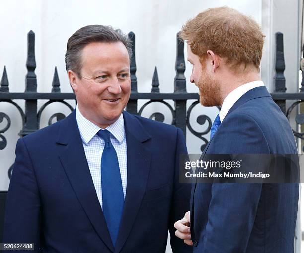 Prime Minister David Cameron and Prince Harry attend a Service of Commemoration for victims of the 2015 Terrorist Attacks in Tunisia at Westminster...