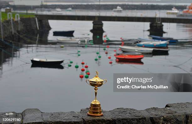 The Ryder Cup trophy overlooks Portrush harbour as part of the Ryder Cup Trophy Tour launch on April 12, 2016 in Portrush, Northern Ireland. The...